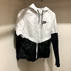 Black and white windbreaker.